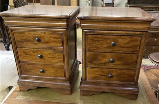 A pair of modern mahogany three drawer bedside chests, width 49cm depth 42cm height 66cm